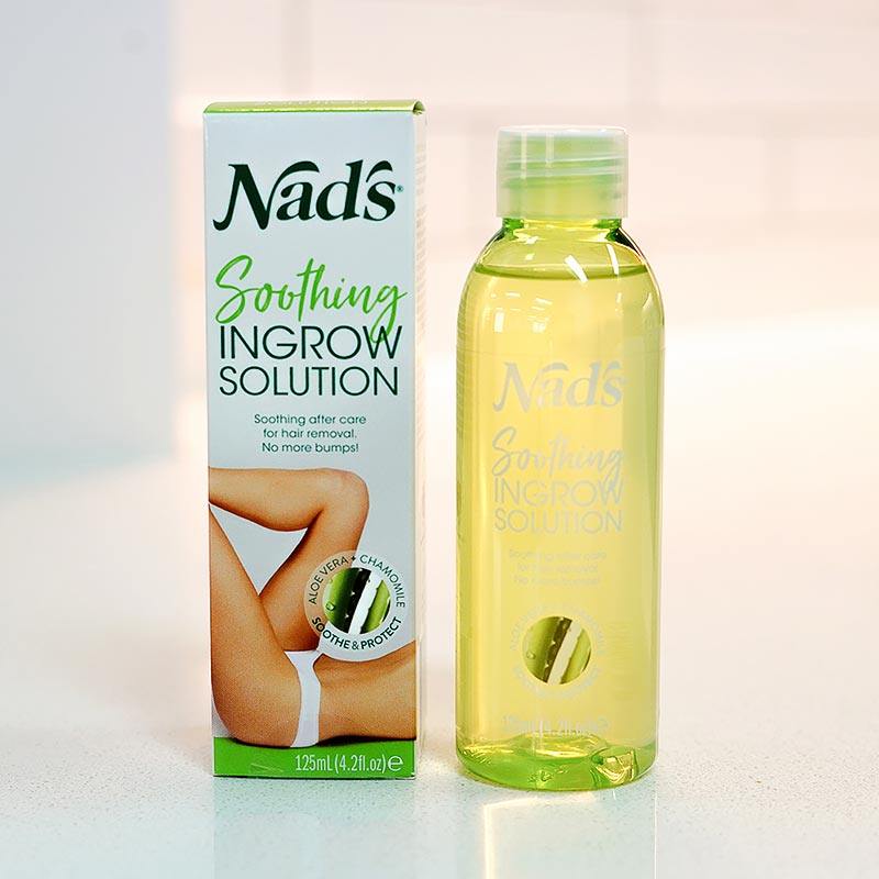 Nad's Soothing Ingrow Solution bottle next to packaging