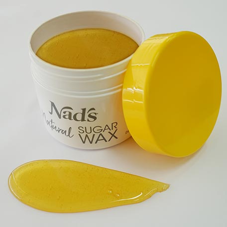 Nad's Natural Sugar Wax open container with wax poured out